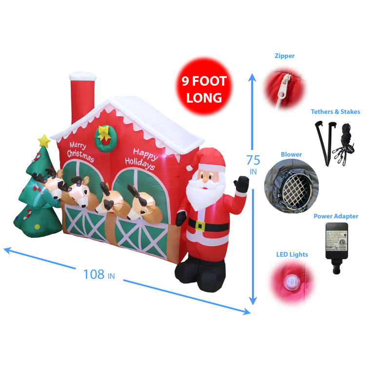 The Holiday Aisle® Christmas Santa Reindeer in Stable Yard Inflatable